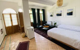 سوئیت یکخوابه چهارنفره پرمیوم (دارای تراس،ویومحدود) (اقامت با صبحانه)