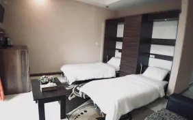 سوئیت یک خوابه سه نفره (ویو غیر مستقیم به دریا) (اقامت با صبحانه)