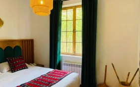 سوئیت تک خواب دو نفره دیلوکس روماک ( طبقه دوم ) (اقامت با صبحانه)