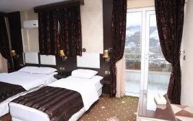 اتاق چهار تخته(نمای گردنه حیران) (اقامت با صبحانه)